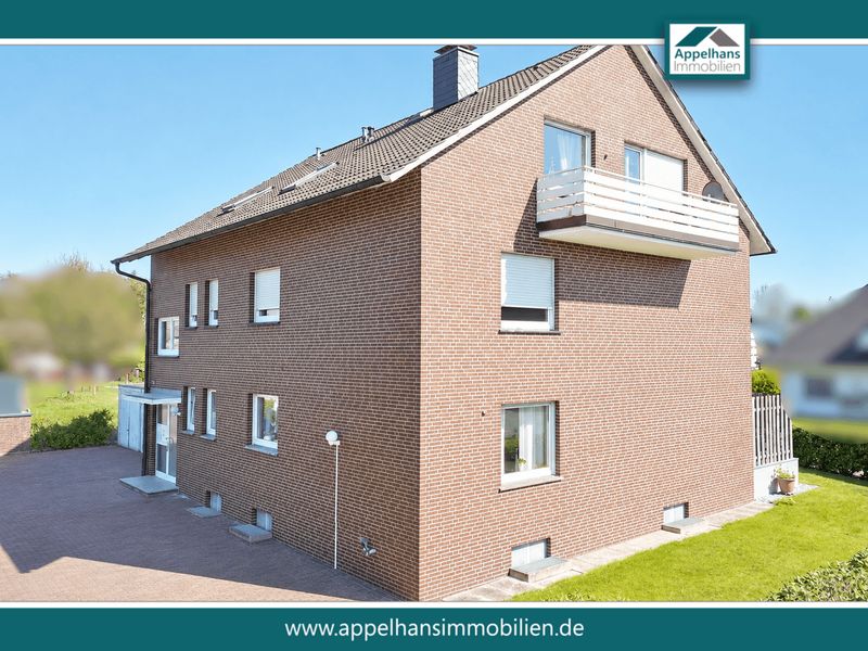Attraktives Mehrfamilienhaus mit Balkon, Terrasse und Garten